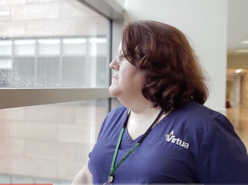 Nurse gazing out window